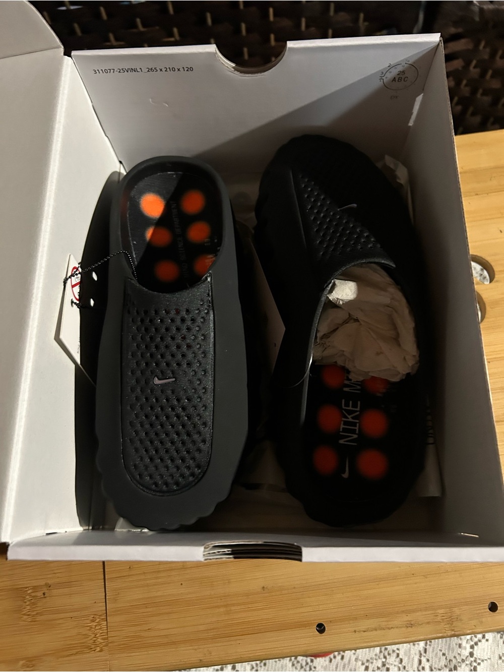 Nike Black Slip-On Sandals with Orange Footbed Pods